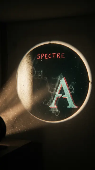 Magic-lantern glass slide of a phantom glyph from a forgotte…